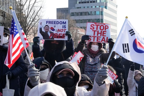 Supporters of impeached South Korean President Yoon Suk Yeol attend a rally to oppose his impeachment near the presidential residence in Seoul, South Korea, Thursday, Jan. 9, 2025. (AP Photo/Ahn Young-joon)