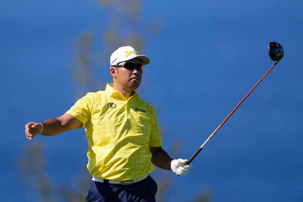 Hideki Matsuyama, of Japan, watches his tee shot on the 13th hole during the final round of The Sentry golf event, Sunday, Jan. 5, 2025, at Kapalua Plantation Course in Kapalua, Hawaii. (AP Photo/Matt York)