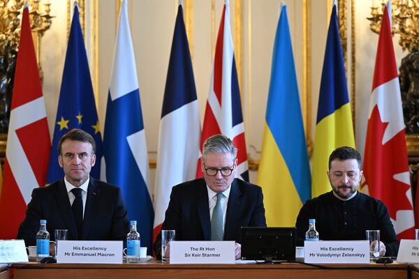 Britain's Prime Minister Keir Starmer, center, France's President Emmanuel Macron, left, and Ukraine's President Volodymyr Zelenskyy at the European leaders' summit to discuss Ukraine, at Lancaster House, London, Sunday March 2, 2025. (Justin Tallis/Pool via AP)