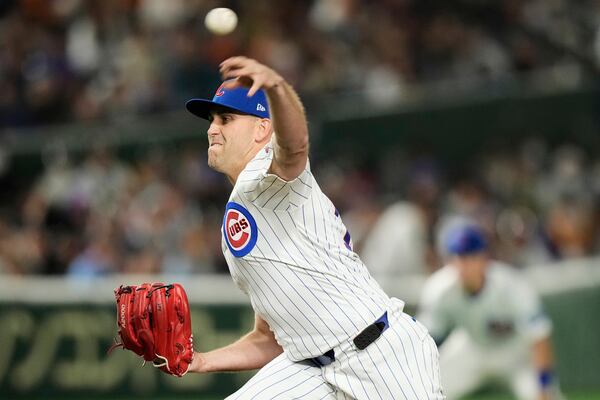 Chicago Cubs' Matthew Boyd throws to the Yomiuri Giants in the sixth inning of an MLB Japan Series exhibition baseball game in Tokyo, Japan, Sunday, March 16, 2025. (AP Photo/Hiro Komae)