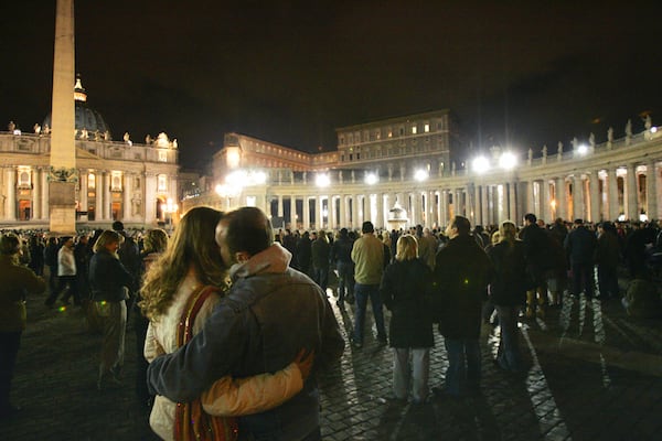 FILE - Faithful and pilgrims attend a rosary vigil prayer for Pope John Paul II's health in St. Peter's Square at The Vatican, Friday, April 1, 2005.(AP Photo/Luca Bruno, File )