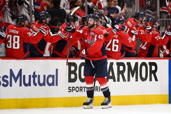 Washington Capitals right wing Tom Wilson (43) celebrates his goal in the second period of Game 5 of a first-round NHL hockey playoff series against the Montreal Canadiens, Wednesday, April 30, 2025, in Washington. (AP Photo/Nick Wass)