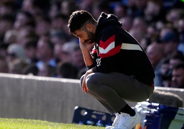 Manchester United manager Ruben Amorim gestures, during the English Premier League soccer match between Everton and Manchester United, at Goodison Park, in Liverpool, England, Saturday, Feb. 22, 2025. (Peter Byrne/PA via AP)