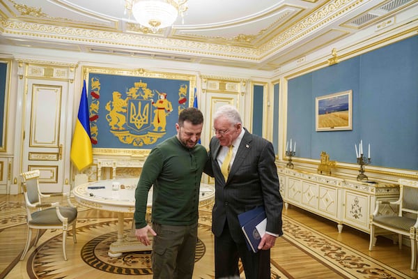 U.S. Special Envoy for Ukraine and Russia Keith Kellogg, right, and Ukraine's President Volodymyr Zelenskyy talk during their meeting in Kyiv, Ukraine, Feb. 20, 2025. (AP Photo/Evgeniy Maloletka)