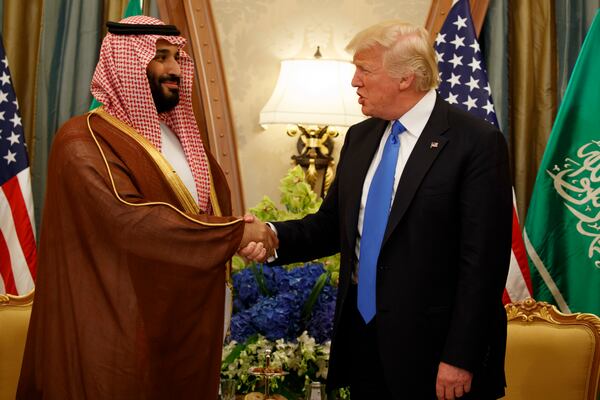 FILE- President Donald Trump, right, shakes hands with Saudi Deputy Crown Prince and Defense Minister Mohammed bin Salman during a bilateral meeting, in Riyadh, May 20, 2017. (AP Photo/Evan Vucci, File)