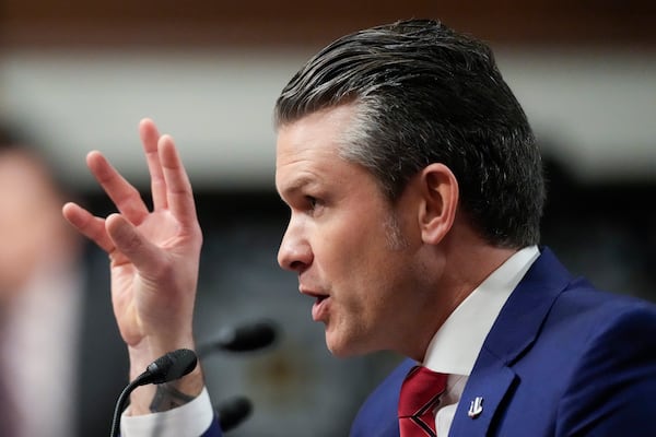 Pete Hegseth, President-elect Donald Trump's choice to be Defense secretary, speaks before the Senate Armed Services Committee for his confirmation hearing, at the Capitol in Washington, Tuesday, Jan. 14, 2025. (AP Photo/Ben Curtis)