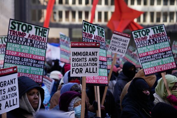 Anti-Trump protesters gather in Federal Plaza to rally for a number of issues, including immigrant rights, the Israel-Hamas war, women's reproductive rights, racial equality and others, on the day of President Trump's Inauguration, Monday, Jan. 20, 2025, in Chicago. (AP Photo/Erin Hooley)