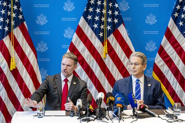 U.S. Trade Representative Jamieson Greer, left, and U.S. Secretary of the Treasury Scott Bessent take part in a press conference after two days of closed-door discussions on trade between the United States and China, in Geneva, Switzerland, Monday, May 12, 2025. (Jean-Christophe Bott/Keystone via AP)