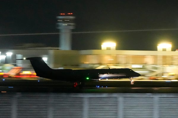 A plane carrying former President Rodrigo Duterte to The Hague takes off in Manila, Philippines on Tuesday, March 11, 2025. (AP Photo/Aaron Favila)