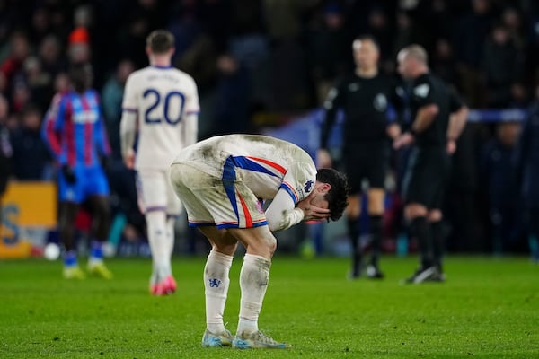 Chelsea's Pedro Neto reacts after the English Premier League soccer match between Crystal Palace and Chelsea in London, Saturday, Jan. 4, 2025. (AP Photo/Dave Shopland)