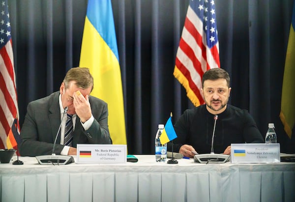 Ukrainian President Volodymyr Zelenskyy, right, and German Defence Minister Boris Pistorius attend a meeting of the Ukraine Contact Group at Ramstein Air Base, Germany, Thursday, Jan. 9, 2025. (Marijan Murat/dpa via AP)