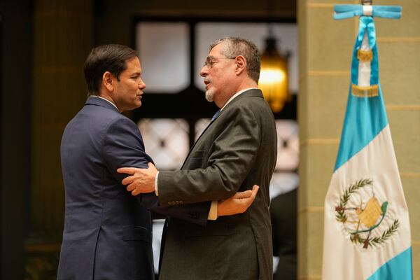 U.S. Secretary of State Marco Rubio, left, embraces Guatemalan President Bernardo Arevalo at the end of their joint news conference at the National Palace in Guatemala City, Wednesday, Feb. 5, 2025. (AP Photo/Mark Schiefelbein, Pool)