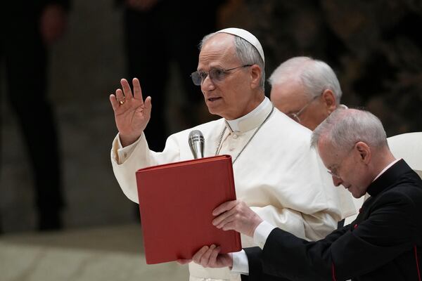 Pope Leo XIV meets members of the international media in the Paul VI Hall at the Vatican, Tuesday, May 13, 2025. (AP Photo/Domenico Stinellis)