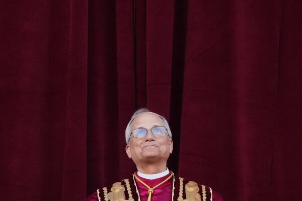 Newly elected Pope Leo XIV appears at the balcony of St. Peter's Basilica at the Vatican, Thursday, May 8, 2025. (AP Photo/Alessandra Tarantino)
