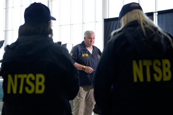 National Transportation Safety Board member Todd Inman speaks with reporters at Ronald Reagan Washington National Airport, Friday, Jan. 31, 2025, in Arlington, Va. (AP Photo/Alex Brandon)