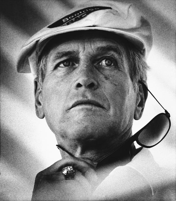 FILE - Actor Paul Newman watches racing at the U.S. Grand Prix in East Rutherford, N.J., June 30, 1985. (AP Photo/Mario Suriani, file)