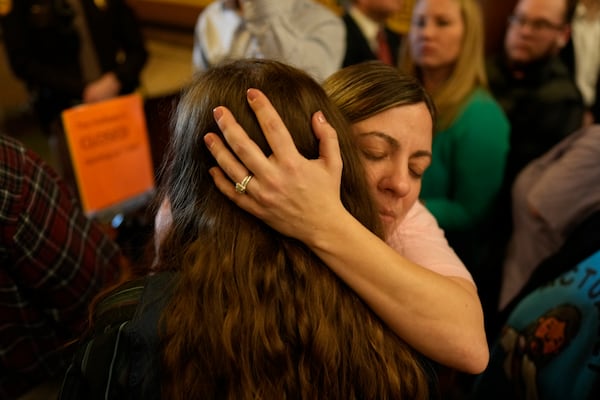 Protesters fill the Iowa state Capitol to denounce a bill that would strip the state civil rights code of protections based on gender identity, Thursday, Feb. 27, 2025, in Des Moines, Iowa. (AP Photo/Charlie Neibergall)