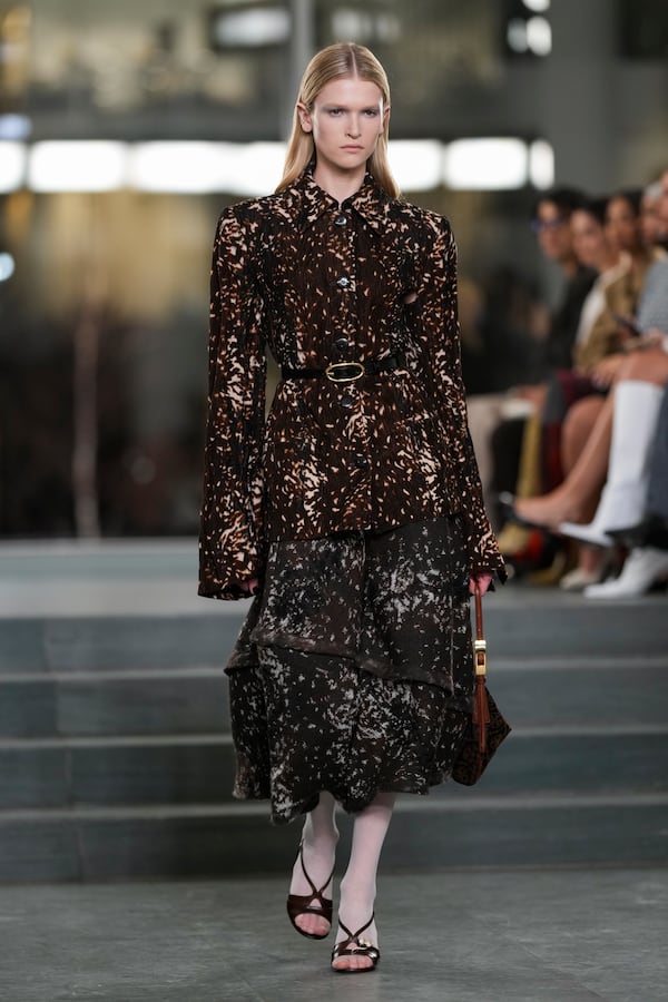 A model walks the runway during the Tory Burch Fall/Winter 2025 fashion show as part of New York Fashion Week on Monday, Feb. 10, 2025, at the Museum of Modern Art in New York. (Photo by Charles Sykes/Invision/AP)