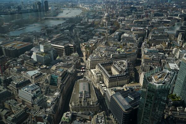 FILE - View of the Bank of England and the Royal Exchange from the Lookout viewing point, in London, Wednesday, April 9, 2025. (AP Photo/Alberto Pezzali, File)