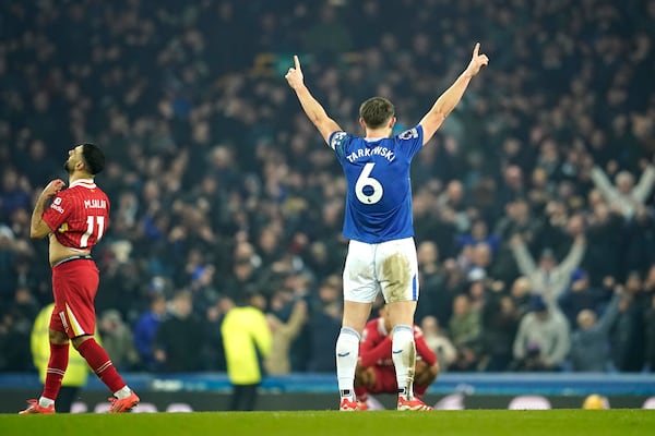 Everton's James Tarkowski reacts during the English Premier League soccer match between Everton and Liverpool, Liverpool, England, Wednesday, Feb.12, 2025. (AP Photo/Dave Thompson)