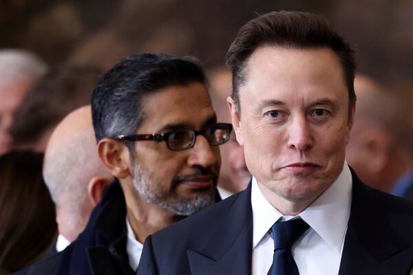 Elon Musk, right, and Google CEO Sundar Pichai arrive before the 60th Presidential Inauguration in the Rotunda of the U.S. Capitol in Washington, Monday, Jan. 20, 2025. (Kevin Lamarque/Pool Photo via AP)