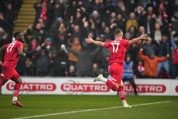 Leyton Orient's Jamie Donley celebrate during the English FA Cup fourth round soccer match between Leyton Orient and Manchester City at the Gaughan Group Stadium in London, England, Saturday, Feb. 8, 2025. (AP Photo/Kin Cheung)