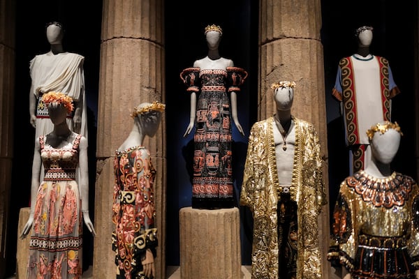 Creations are displayed during the exhibition "From the Heart to the Hands: Dolce&Gabbana" at the Grand Palais, in Paris, Thursday, Jan. 9, 2025. (AP Photo/Thibault Camus)