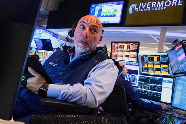 Trader Vincent Napolitano works on the floor of the New York Stock Exchange, Thursday, May 1, 2025. (AP Photo/Richard Drew)