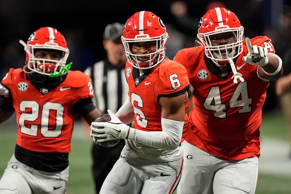 Georgia defensive back Daylen Everette (6) celebrates his interception Texas during the second half of the Southeastern Conference championship NCAA college football game, Saturday, Dec. 7, 2024, in Atlanta. (AP Photo/John Bazemore)