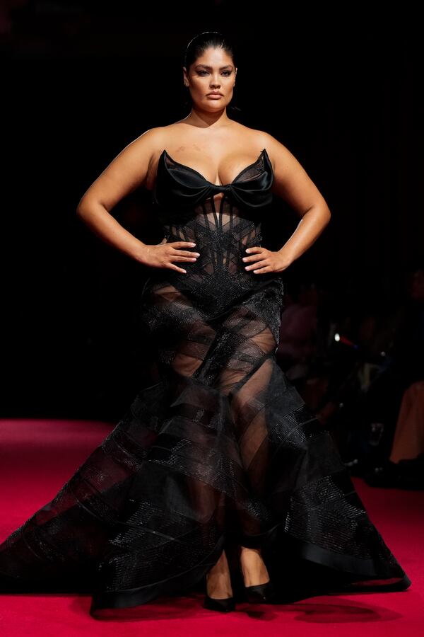 A model walks the runway during the Christian Siriano Fall/Winter 2025 fashion show at Chelsea Industrial during New York Fashion Week on Thursday, Feb. 6, 2025, in New York. (Photo by Charles Sykes/Invision/AP)