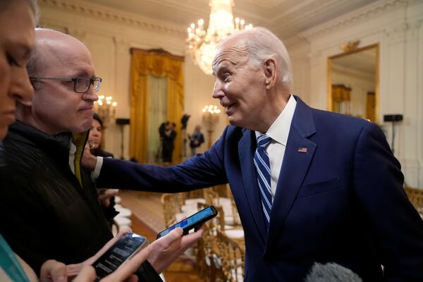 President Joe Biden speaks with reporters after signing the Social Security Fairness Act in the East Room of the White House, Sunday, Jan. 5, 2025, in Washington. (AP Photo/Manuel Balce Ceneta)