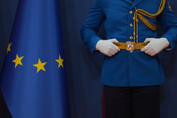 A member of the Serbian honour guard prepares for a press conference of European Council President Antonio Costa and Serbian President Aleksandar Vucic at the Serbia Palace in Belgrade, Serbia, Tuesday, May 13, 2025. (AP Photo/Darko Vojinovic)