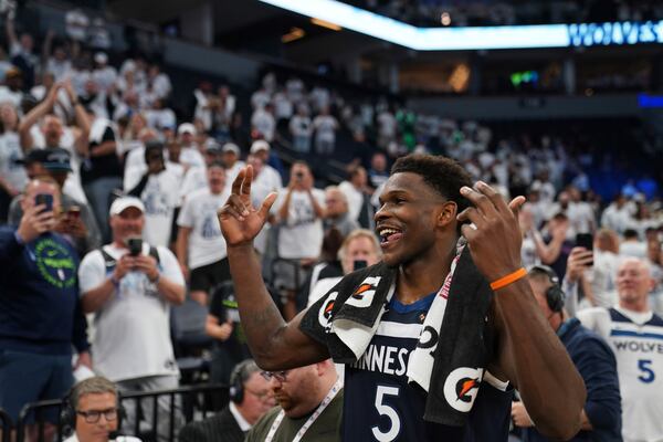 Minnesota Timberwolves guard Anthony Edwards (5) celebrates a win against the Golden State Warriors after Game 5 of an NBA basketball second-round playoff series, Thursday, May 15, 2025, in Minneapolis. (AP Photo/Abbie Parr)