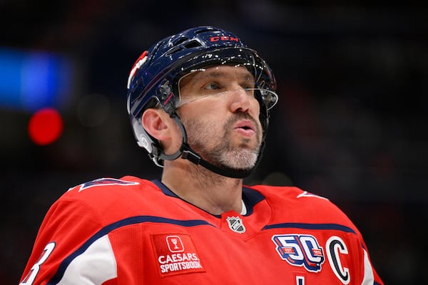 FILE - Washington Capitals left wing Alex Ovechkin reacts during the first period of an NHL hockey game against the Edmonton Oilers, Sunday, Feb. 23, 2025, in Washington. (AP Photo/Nick Wass, File)