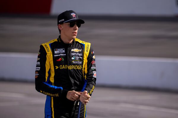 Carson Hocevar walks out to his car before the NASCAR All-Star Open auto race Sunday, May 18, 2025, in North Wilkesboro, N.C. (AP Photo/Scott Kinser)