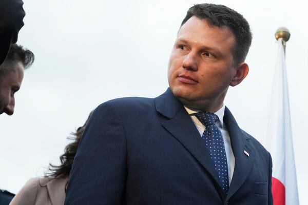 Far-right Confederation party's presidential candidate Sławomir Mentzen speaks to supporters in Saturday,Warsaw, Poland, May 10, 2025. (AP Photo/Czarek Sokolowski)