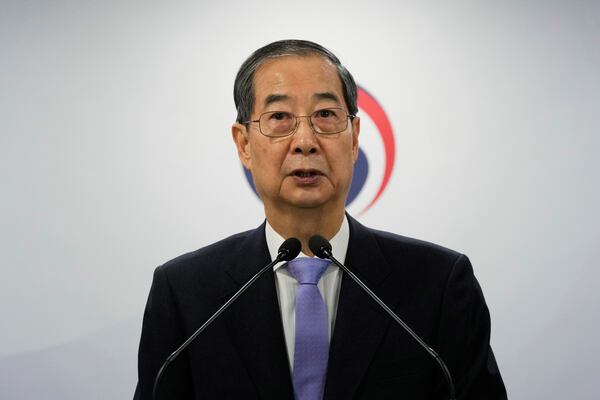 South Korean acting President Han Duck-soo speaks during a briefing at the Government Complex in Seoul, South Korea, Monday, March 24, 2025. (AP Photo/Ahn Young-joon, Pool)