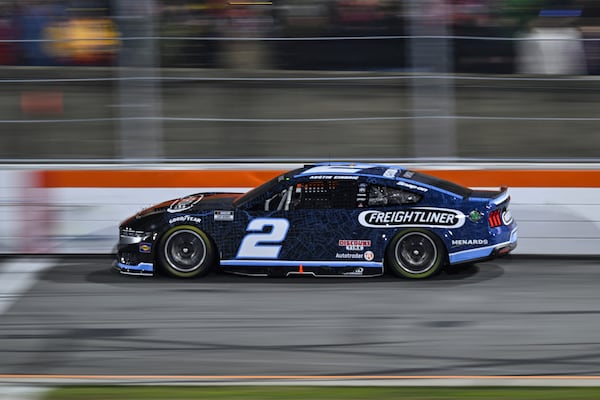 Austin Cindric steers down the back stretch during a NASCAR Cup Series auto race at Bowman Gray Stadium, Sunday, Feb. 2, 2025, in Winston-Salem, N.C. (AP Photo/Matt Kelley)