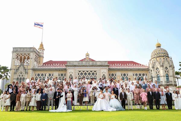 A group of LGBTQ pose for a picture as a part of celebration of a marriage equality bill at Government house in Bangkok, Thailand, on Jan. 15, 2025. (AP Photo/Jirasak jivawavatanawanit)