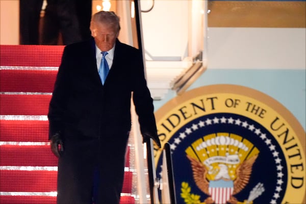 President Donald Trump arrives on Air Force One, Wednesday, Feb. 19, 2025, at Joint Base Andrews, Md, after returning from Florida. (AP Photo/Mark Schiefelbein)