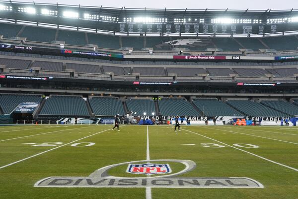 FILE - The logo for the NFL football NFC divisional playoff game between the Philadelphia Eagles and the Los Angeles Rams is visible on the field on Sunday, Jan. 19, 2025, in Philadelphia. (AP Photo/Matt Slocum, file)