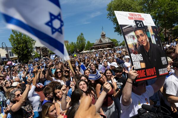 People gathered in Huyler Park celebrate the release of American hostage Edan Alexander from Hamas on Monday, May 12, 2025 in Tenafly, N.J. (AP Photo/Stefan Jeremiah)