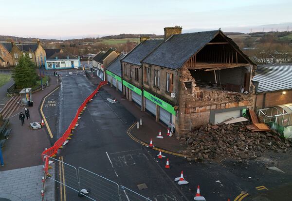 A view of damage to the side of the Co-op store after Storm Eowyn, in Denny, Scotland, Sunday Jan. 26, 2025. (Andrew Milligan/PA via AP)