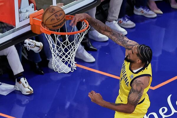 Indiana Pacers forward Obi Toppin (1) misses a dunk against the New York Knicks during the second quarter of Game 1 of the NBA basketball Eastern Conference final, Wednesday, May 21, 2025, in New York. (AP Photo/Adam Hunger)