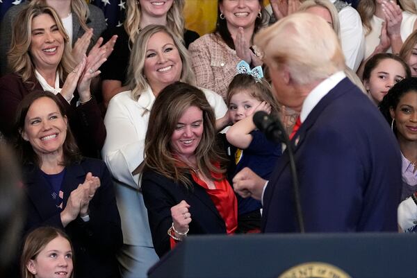 President Donald Trump gestures as he speaks before signing an executive order barring transgender female athletes from competing in women's or girls' sporting events, in the East Room of the White House, Wednesday, Feb. 5, 2025, in Washington. (AP Photo/Alex Brandon)