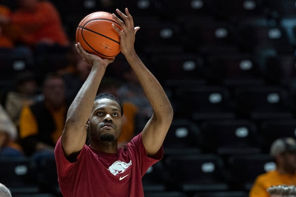 Former Tennessee player and current Arkansas forward Jonas Aidoo (9) shoots during warmups before an NCAA college basketball game against Tennessee, Saturday, Jan. 4, 2025, in Knoxville, Tenn. (AP Photo/Wade Payne)