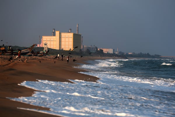 Fishermen park their boats on the shore near the Madras Atomic Power Station located at Kalpakkam, in the Indian state of Tamil Nadu, Monday, Feb. 10, 2025. (AP Photo/ R. Parthibhan)