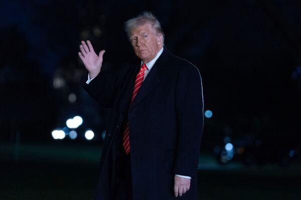 President Donald Trump waves to the media as he walks on the South Lawn of the White House, in Washington, Saturday, March 22, 2025. (AP Photo/Jose Luis Magana)