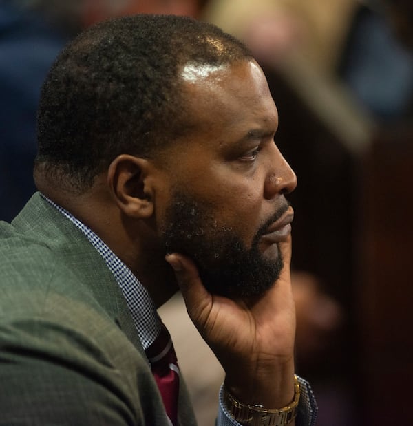 Lee Merritt, a lawyer for Wanda Cooper-Jones listens to opening statements Tuesday, Jan. 28, 2025, in Brunswick, Ga., in the trial of former Brunswick Judicial Circuit District Attorney Jackie Johnson who is accused of obstruction of justice and violating her oath of office in the investigation of Cooper-Jones’ son, Ahmaud Arbery. (Terry Dickson/The Brunswick News via AP, Pool)