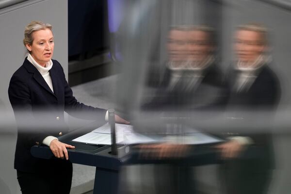 Alice Weigel co-leader of the Alternative for Germany, AfD, party speaks during a debate about migration at the German parliament Bundestag in Berlin, Germany, Wednesday, Jan. 29, 2025. (AP Photo/Markus Schreiber)